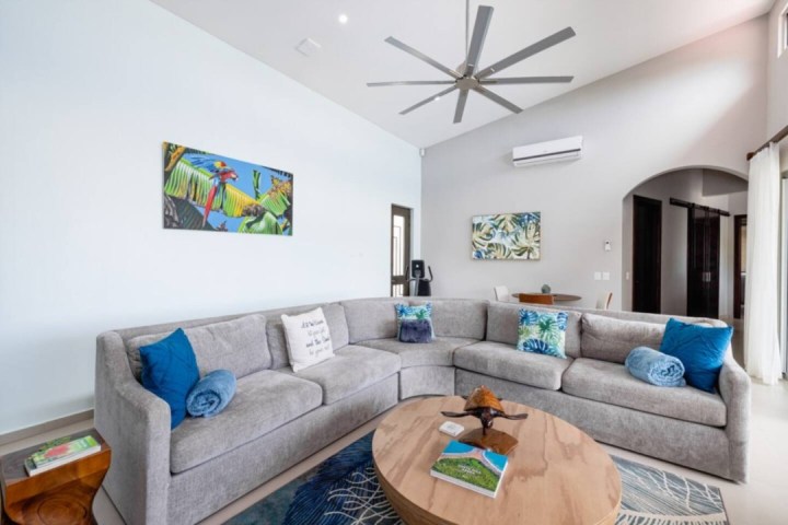 a living room filled with furniture and a fireplace
