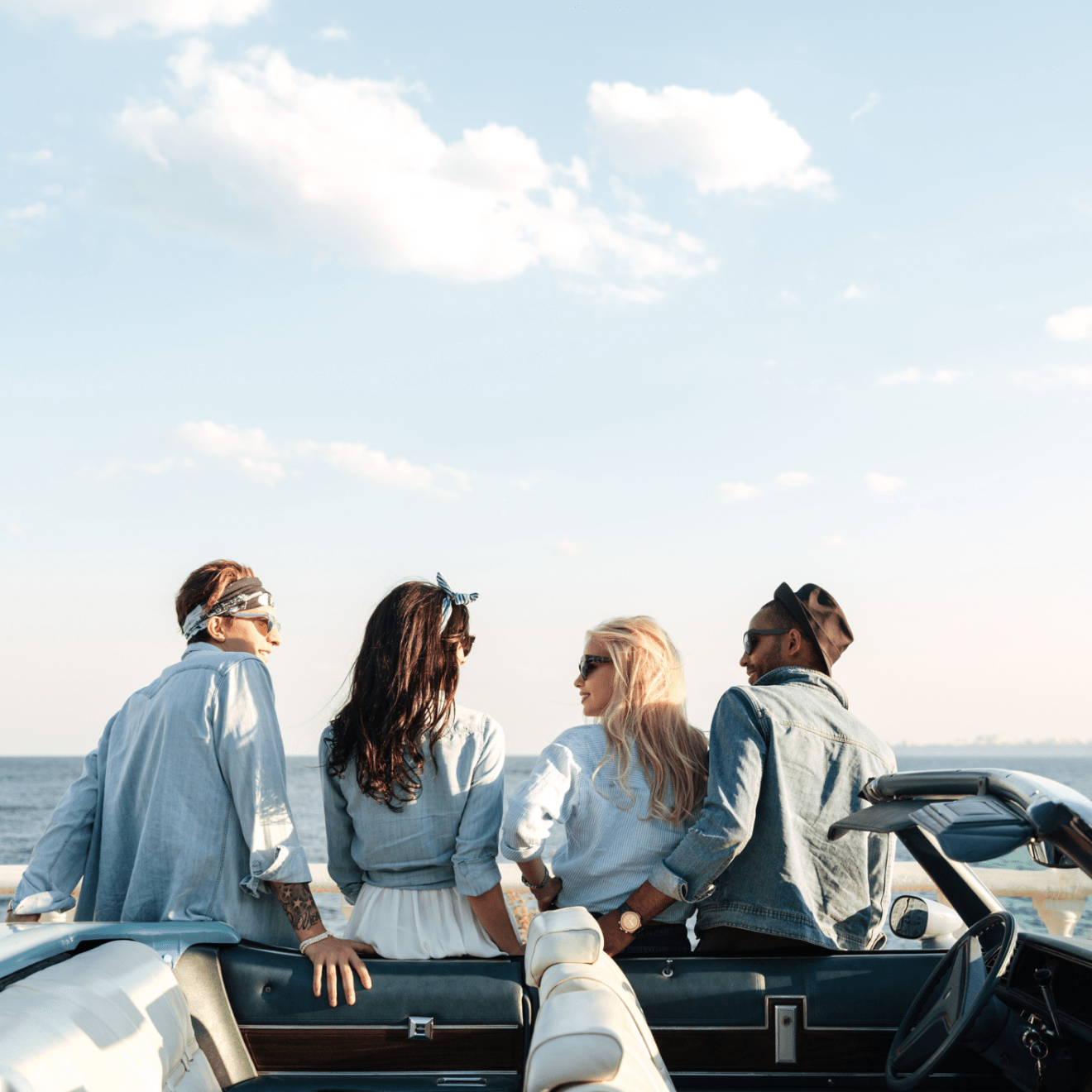 a couple of people that are sitting on a boat in the water