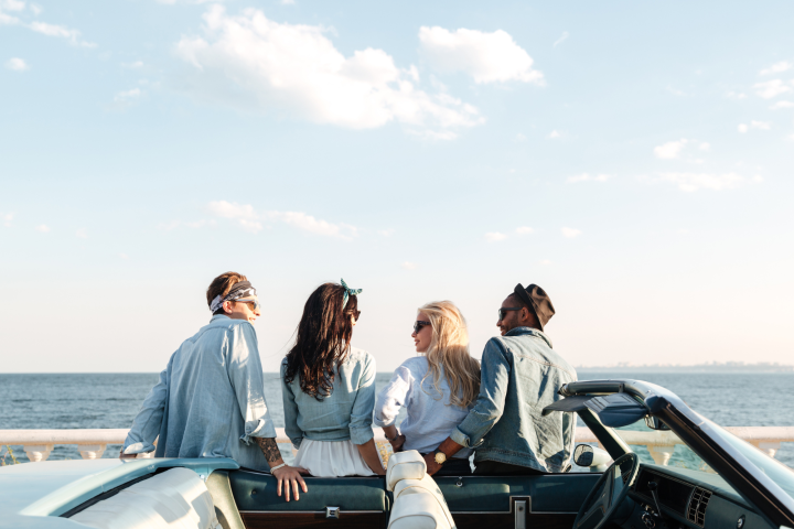 a couple of people that are sitting on a boat in the water