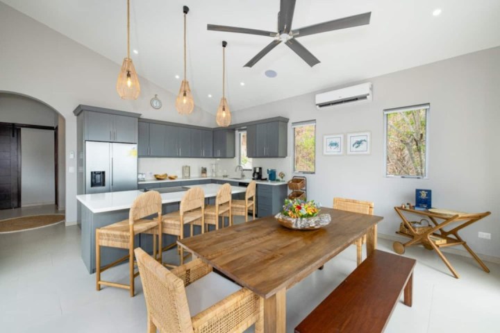 a living room filled with furniture on top of a wooden table
