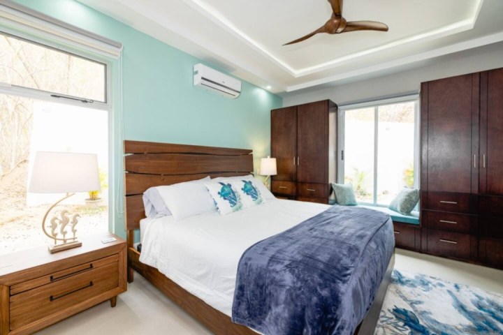 a bedroom with a large bed in a room