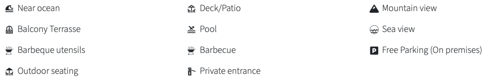 Icons and text listing amenities like pool, mountain view, sea view, and free parking.