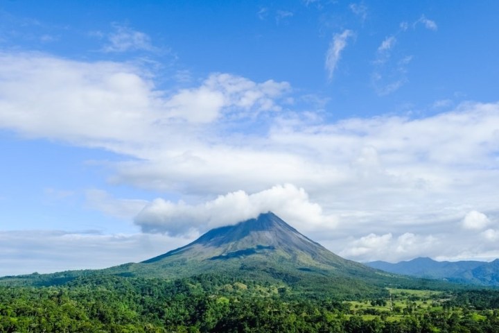a large mountain in the background