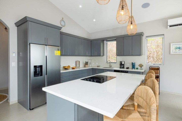 a modern kitchen with stainless steel appliances