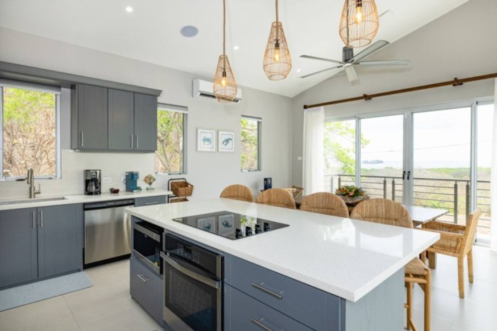 a kitchen with a sink and a window