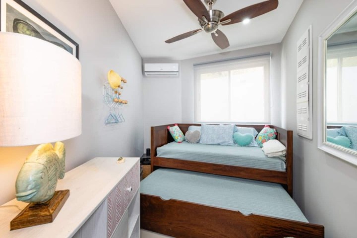 a bedroom with a large window