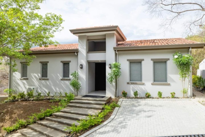 a house on the side of a building