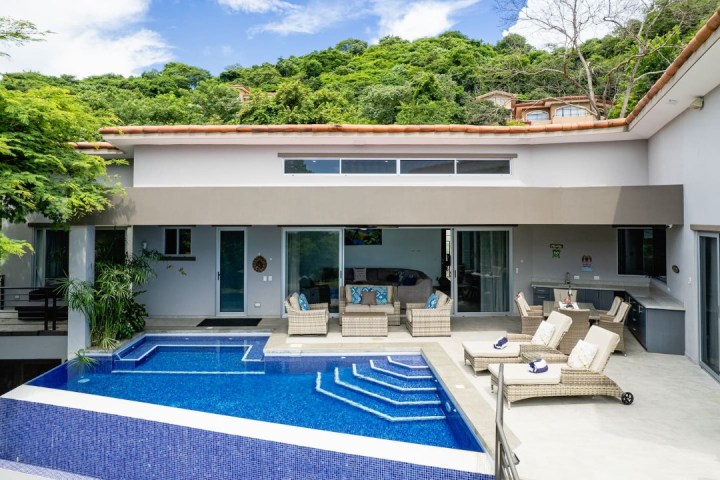 a kitchen with a blue background