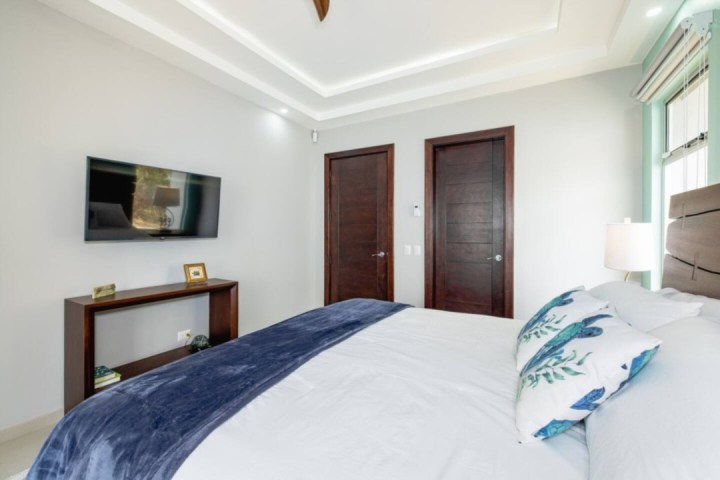 a bedroom with a bed in a hotel room