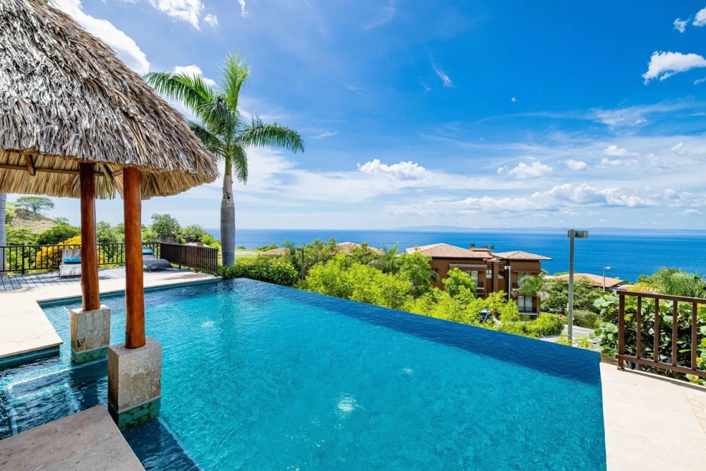 a pool next to a body of water