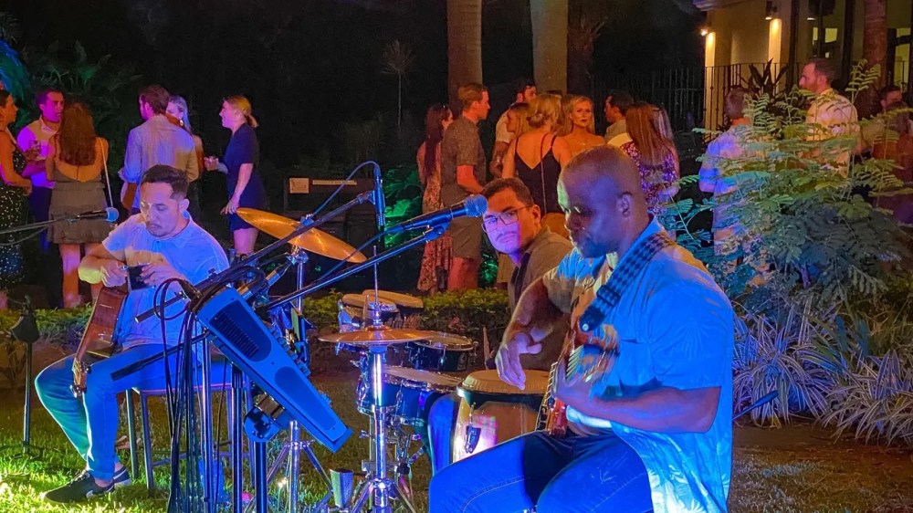 a group of people sitting on a stage