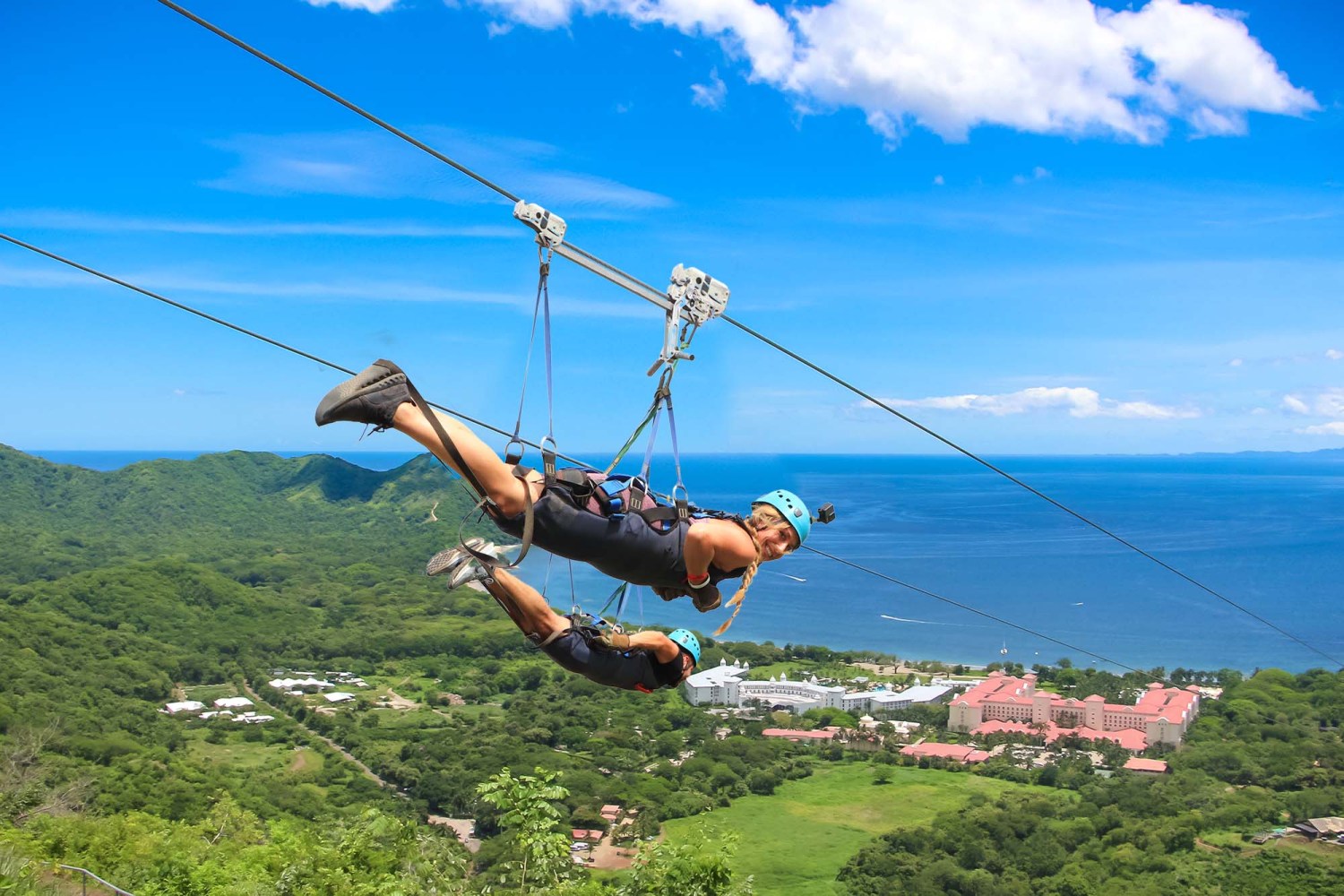 a person in a swing in a body of water