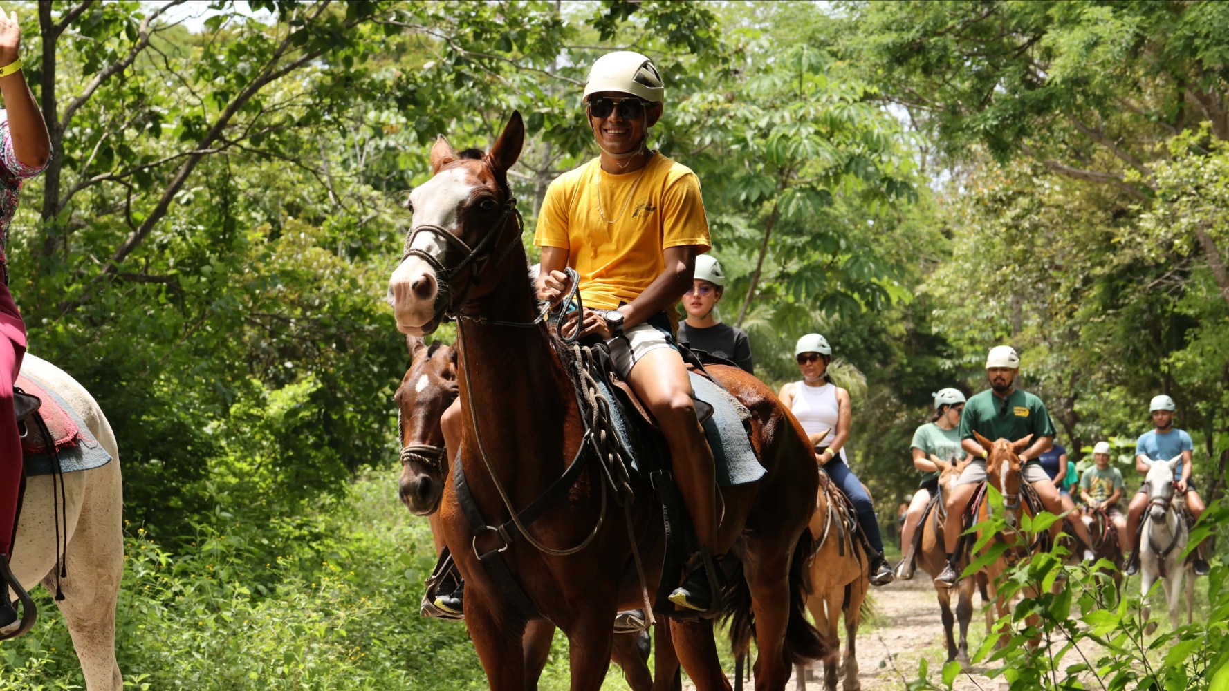 a group of people riding on the back of a horse