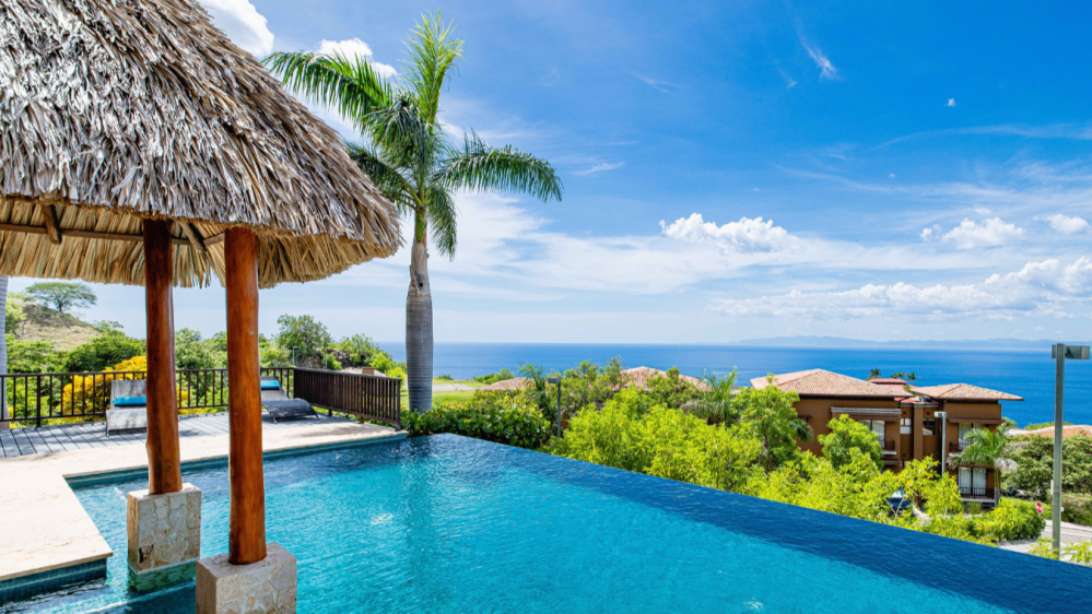 a pool next to a body of water
