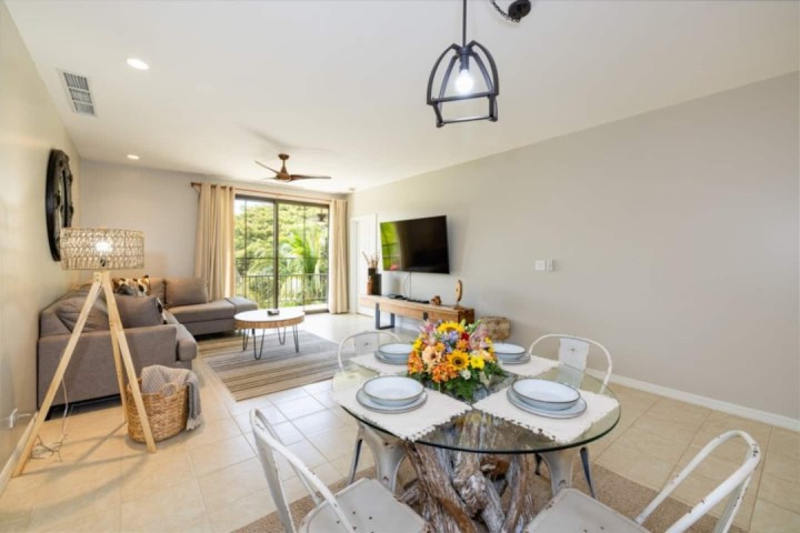 a living room filled with furniture and a fireplace