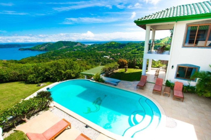 a pool next to a body of water