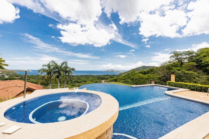 a pool next to a body of water