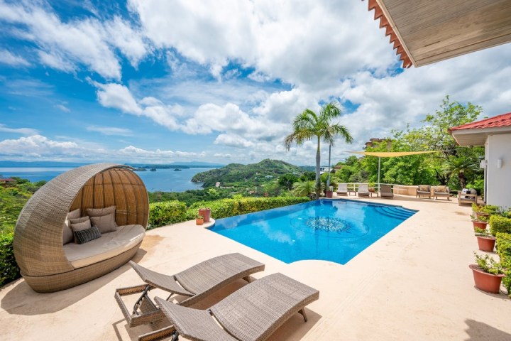 a table topped with a blue umbrella